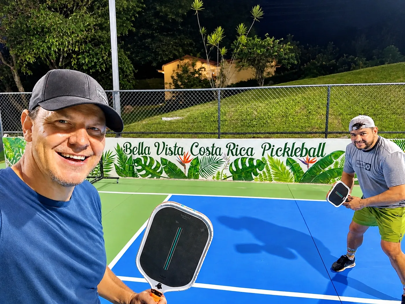 Players enjoying an evening pickleball game under the lights at Bella Vista Costa Rica Pickleball