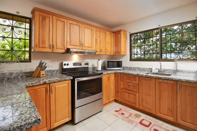 Kitchen & sitting room — The Guest House, Bella Vista Private Resort Costa Rica