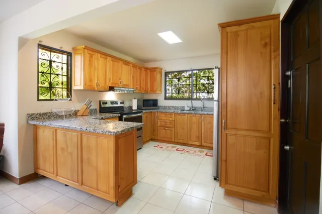 Kitchen & sitting room — The Guest House, Bella Vista Private Resort Costa Rica