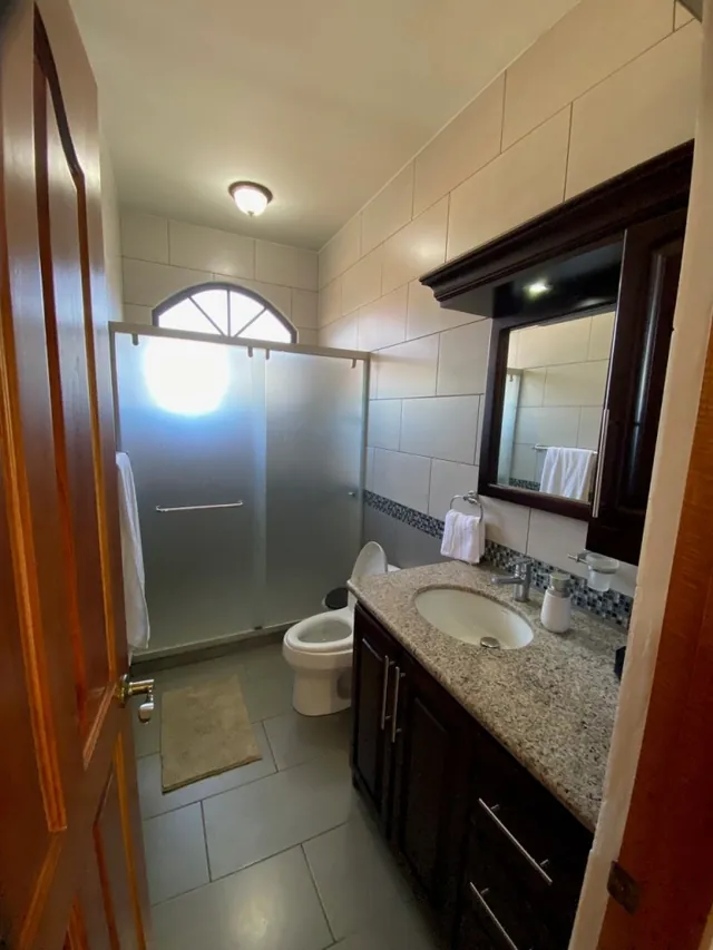 Ground-floor bathrooms (2 & 3) — The Main House, Bella Vista Private Resort Costa Rica