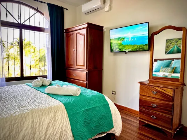 Bedroom 3 — queen bed + bunk (twins) — The Main House, Bella Vista Private Resort Costa Rica