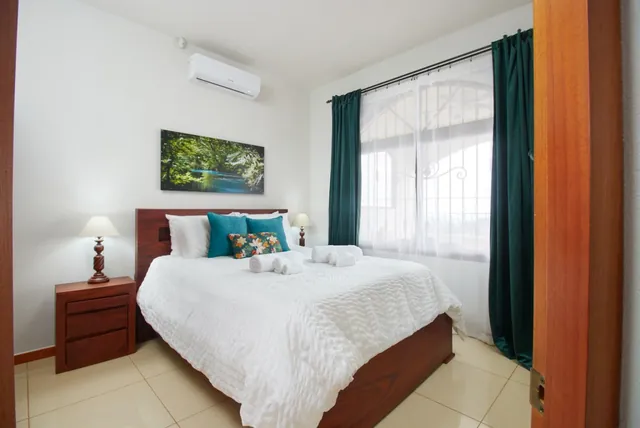 Bedroom 4 — second floor · queen bed — The Main House, Bella Vista Private Resort Costa Rica
