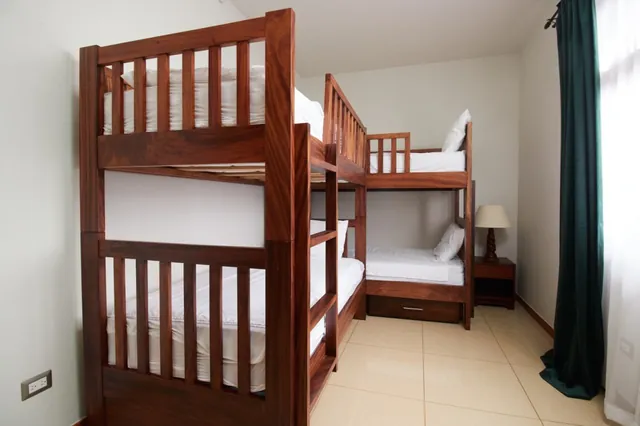 Bedroom 5 — second floor · two bunk beds — The Main House, Bella Vista Private Resort Costa Rica