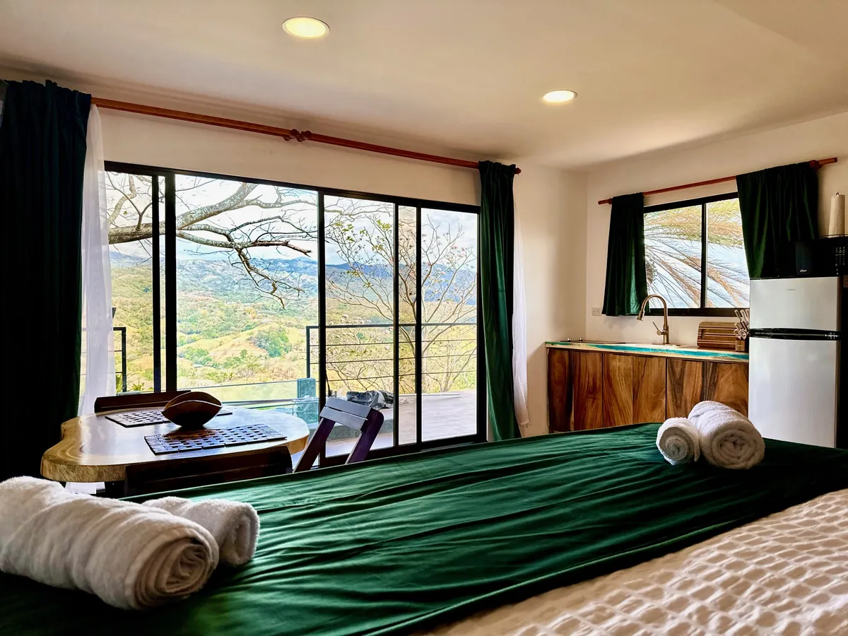 Treehouse bedroom with mountain view at Bella Vista Costa Rica