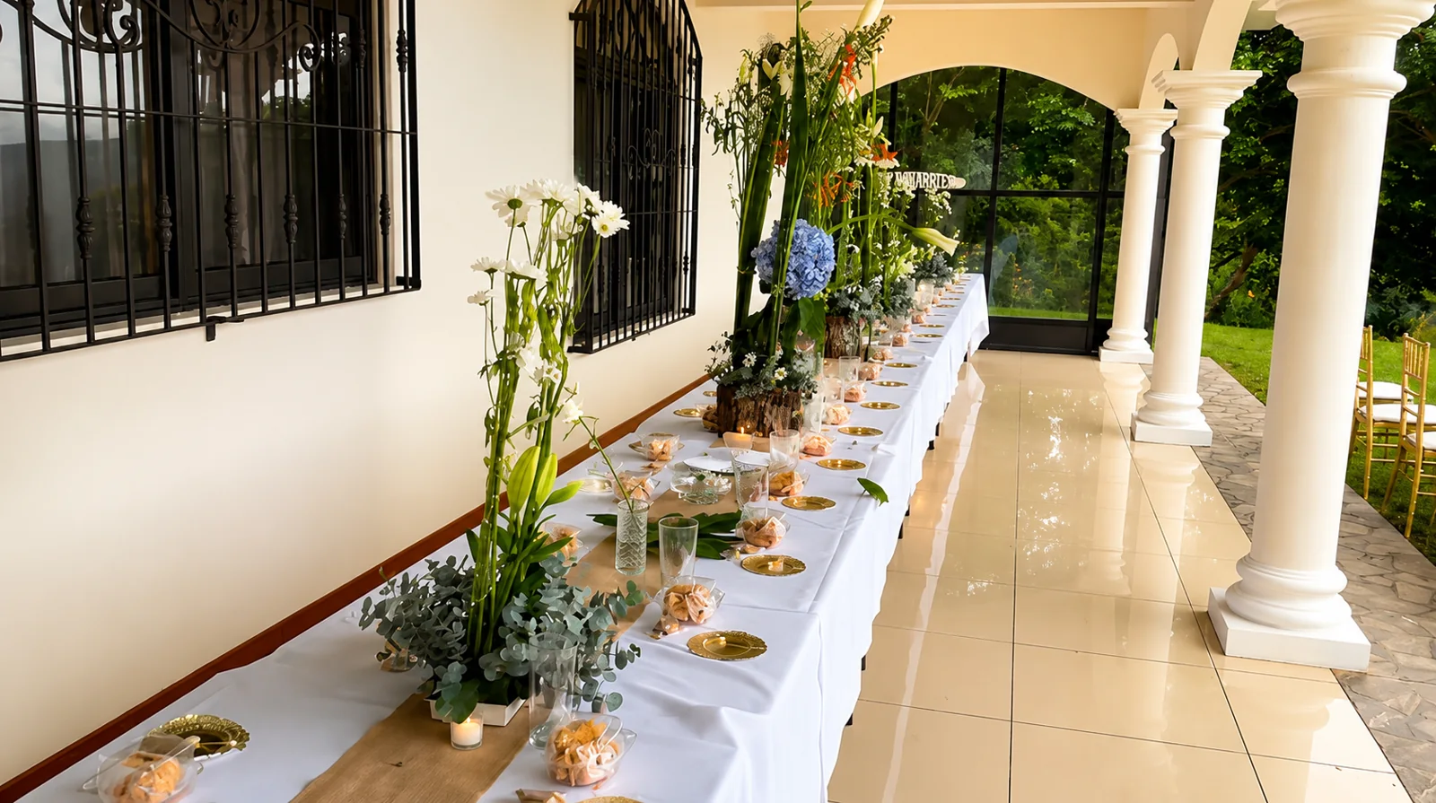 Wedding reception dinner table set on the covered arched back-patio terrace at Bella Vista Costa Rica